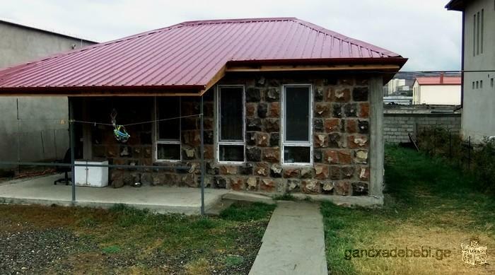 brick and tuff stone house in Didi Dighomi