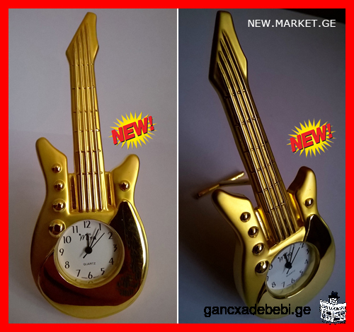 absolutely new original "Guitar" clock the desktop clock completely new in original packaging