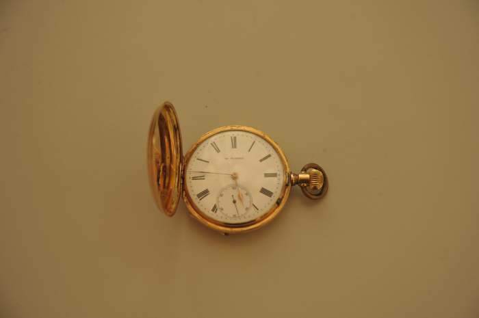 sold,Antique gold clock